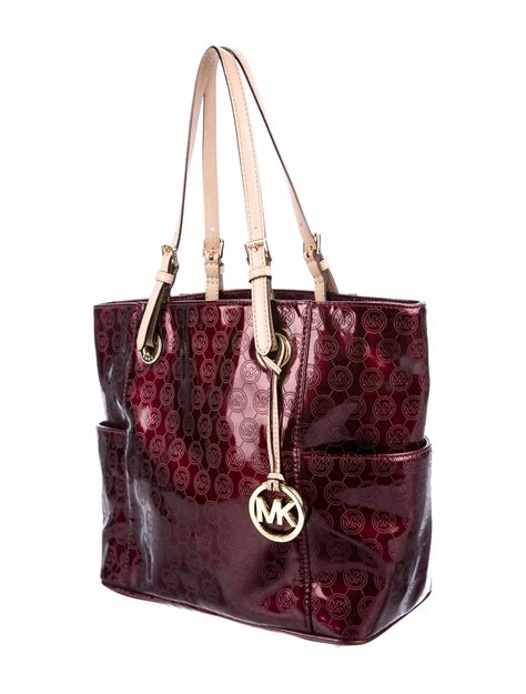 herbergers michael kors purse|Michael Kors leather tote.